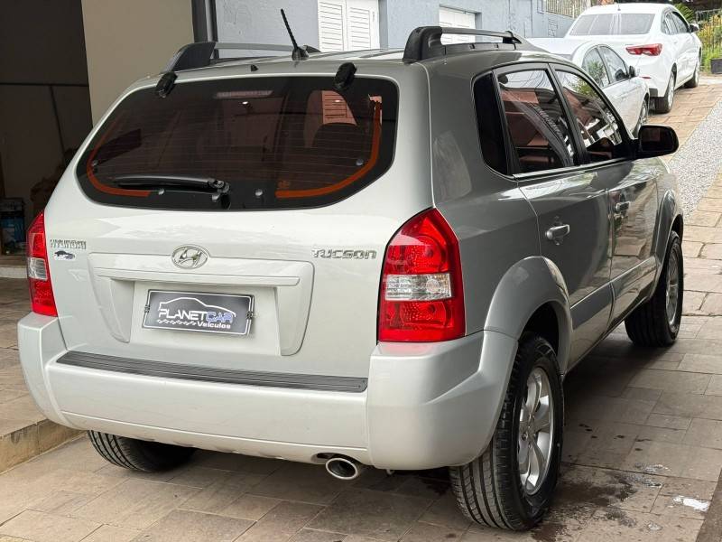 HYUNDAI - TUCSON - 2010/2011 - Prata - R$ 43.500,00